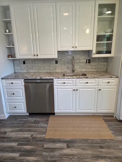 Wood kitchen cabinetry and island illustrating a Cape May County kitchen remodel