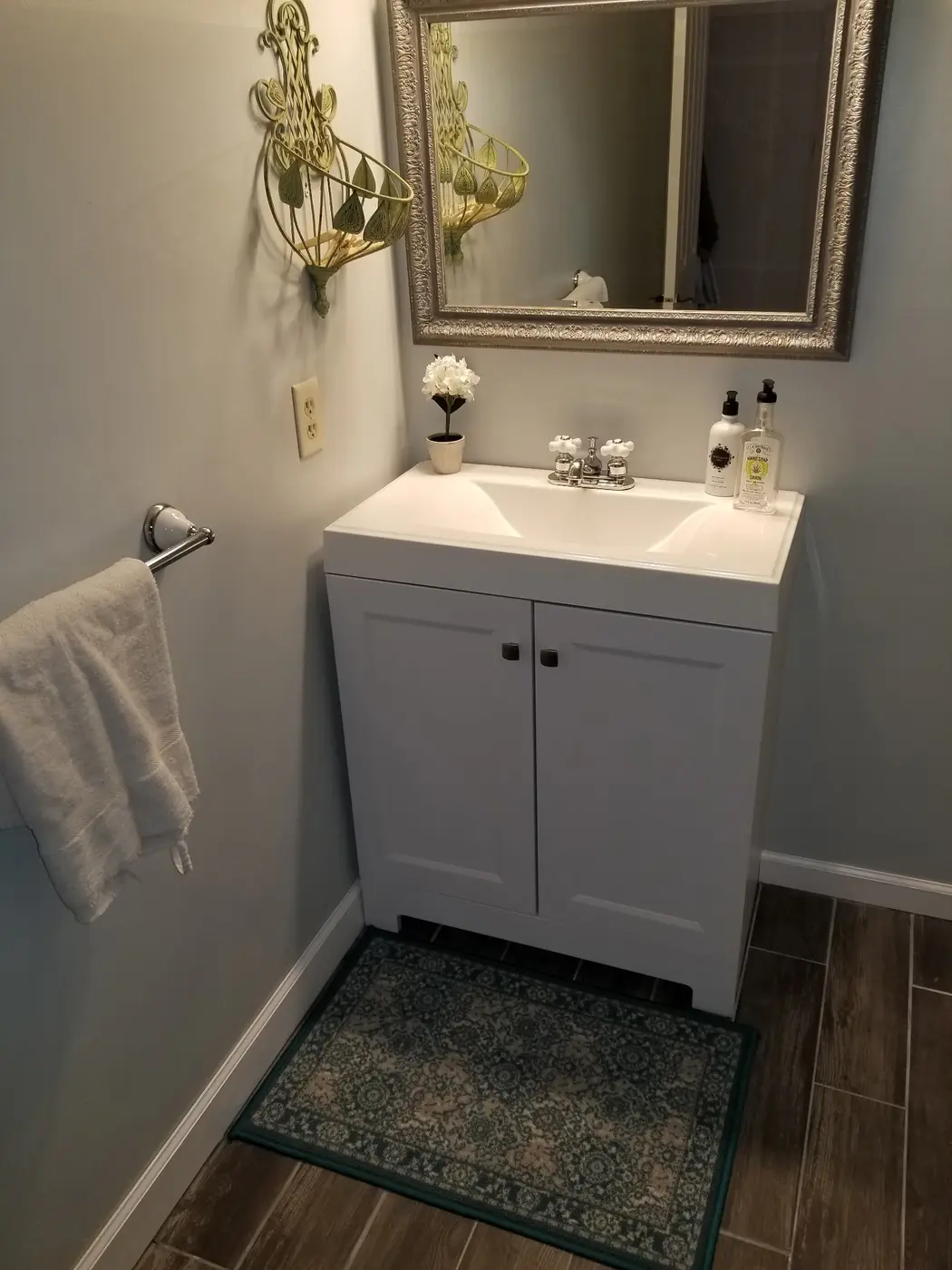 Finished bathroom vanity and mirror