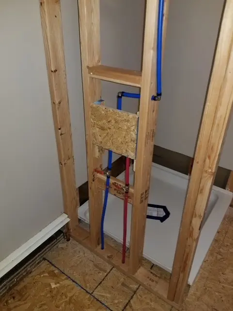 Bathroom renovation framing and new plumbing lines