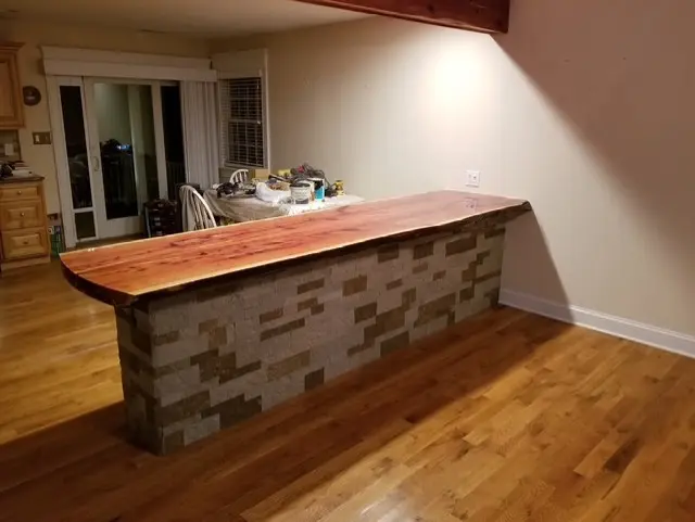 Wide view of the completed custom cedar-top bar