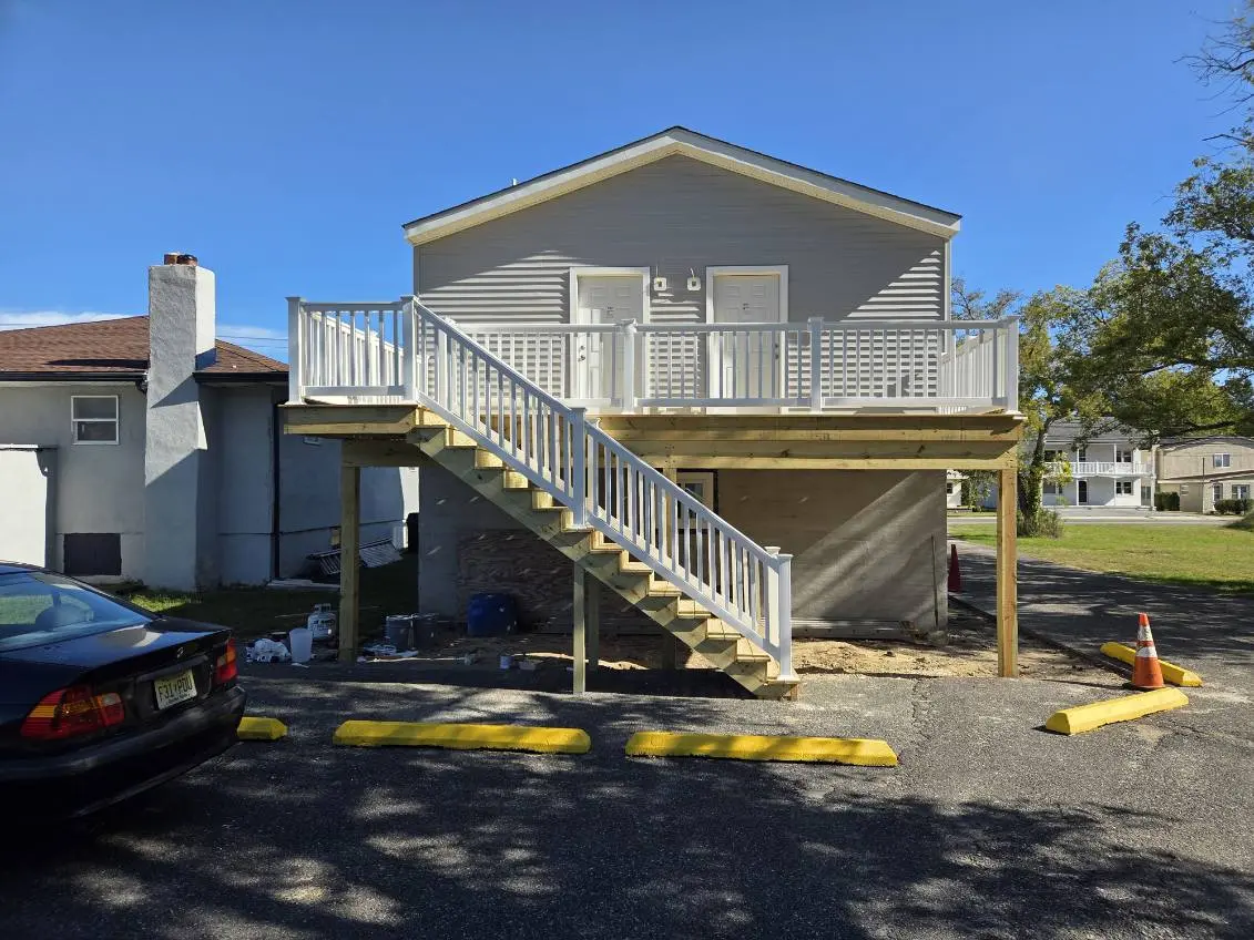 Completed elevated deck and roof work by Cedar Tough Builders