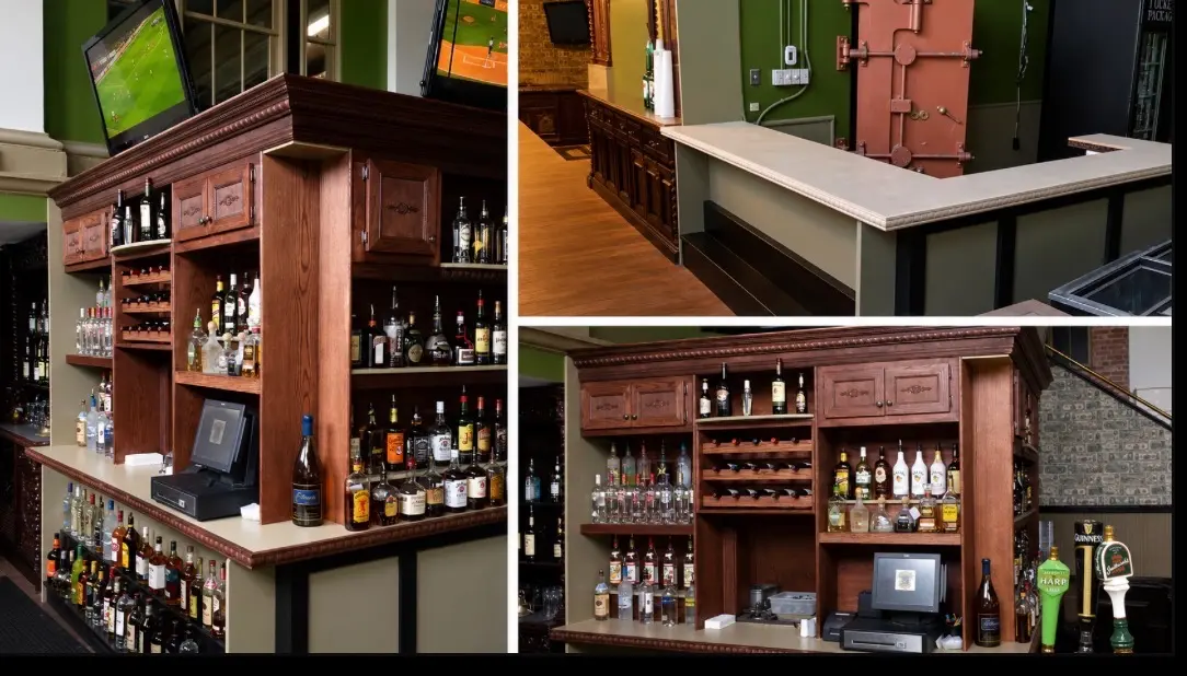 Finished custom wood bar with storage and display shelving